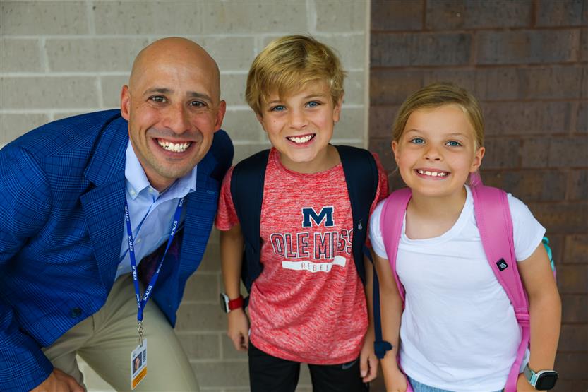 People smile on the first day of school